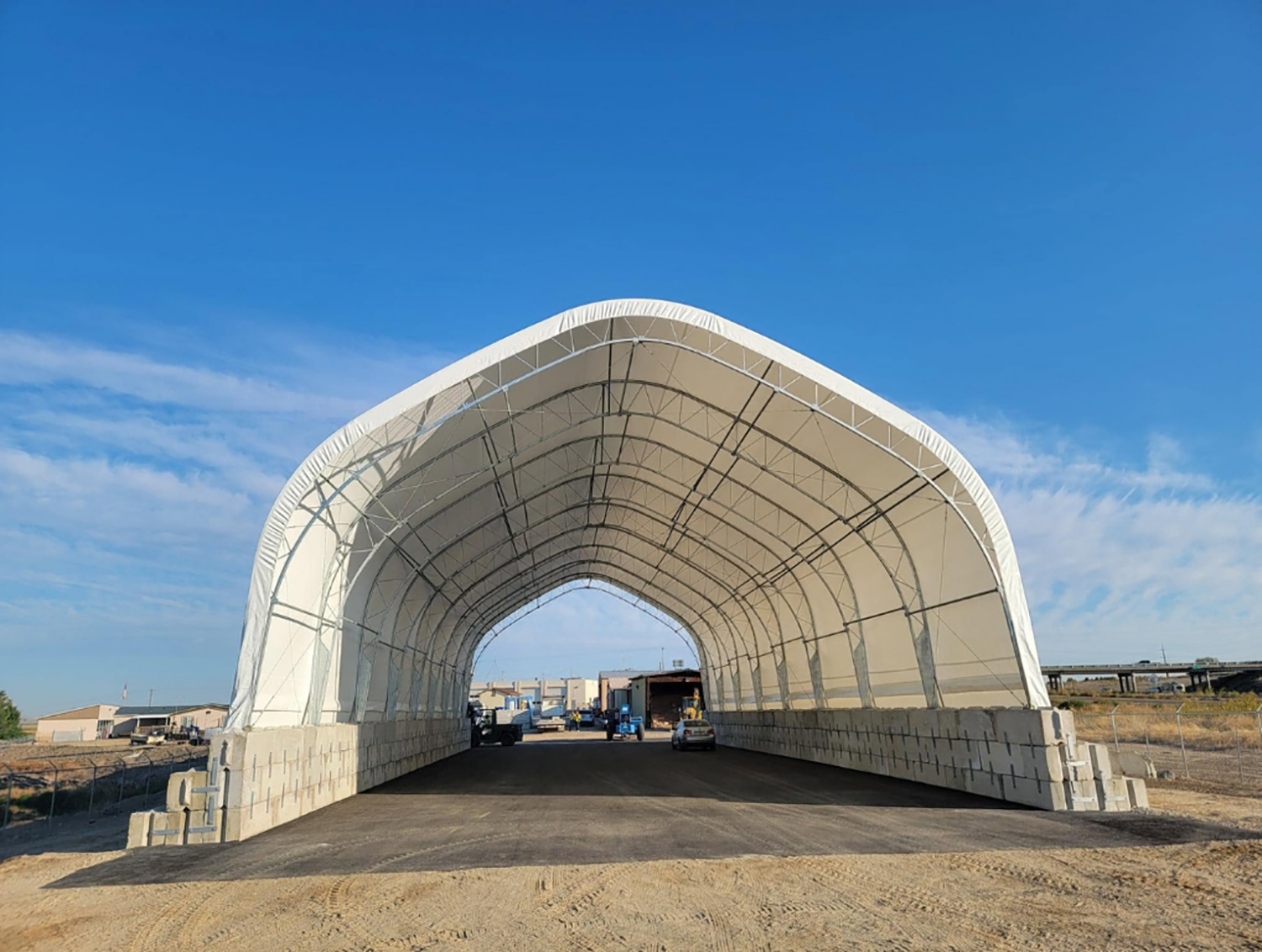 KEEPING BULK MATERIALS COVERED WITHOUT SLOWING OPERATIONS