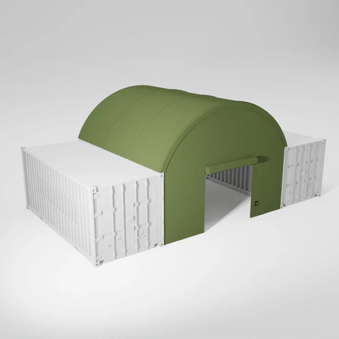 White shipping containers with olive green canvas shelter.