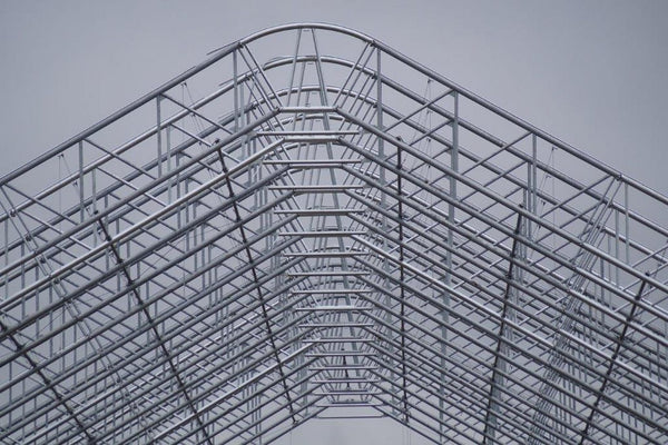 Heavy-duty clear span fabric building by Sheltirx